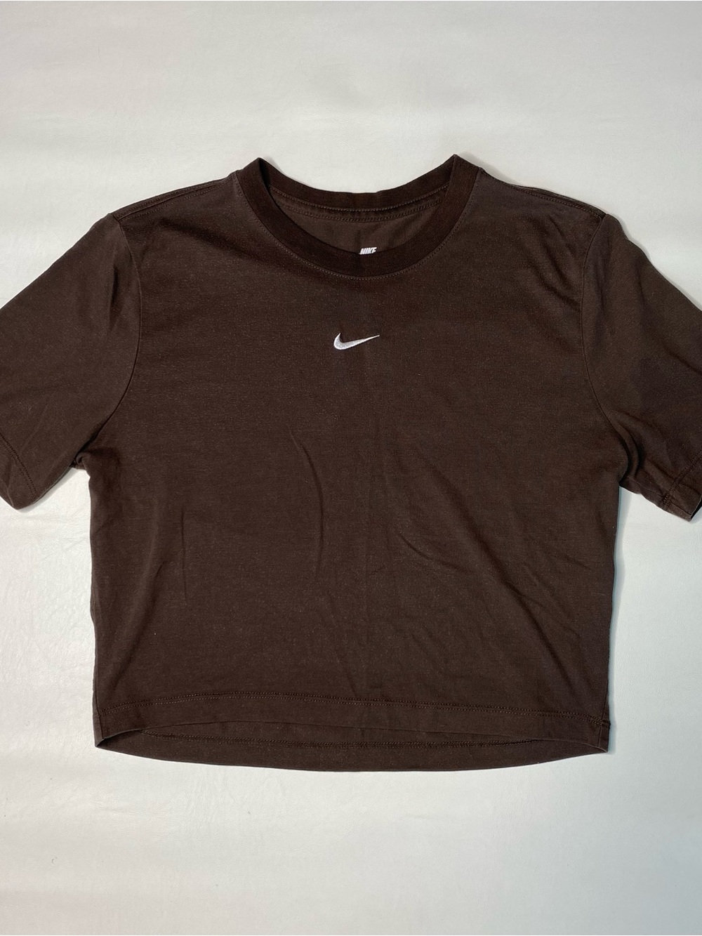 Nike Women’s Brown Cropped Swoosh Tee — White Logo